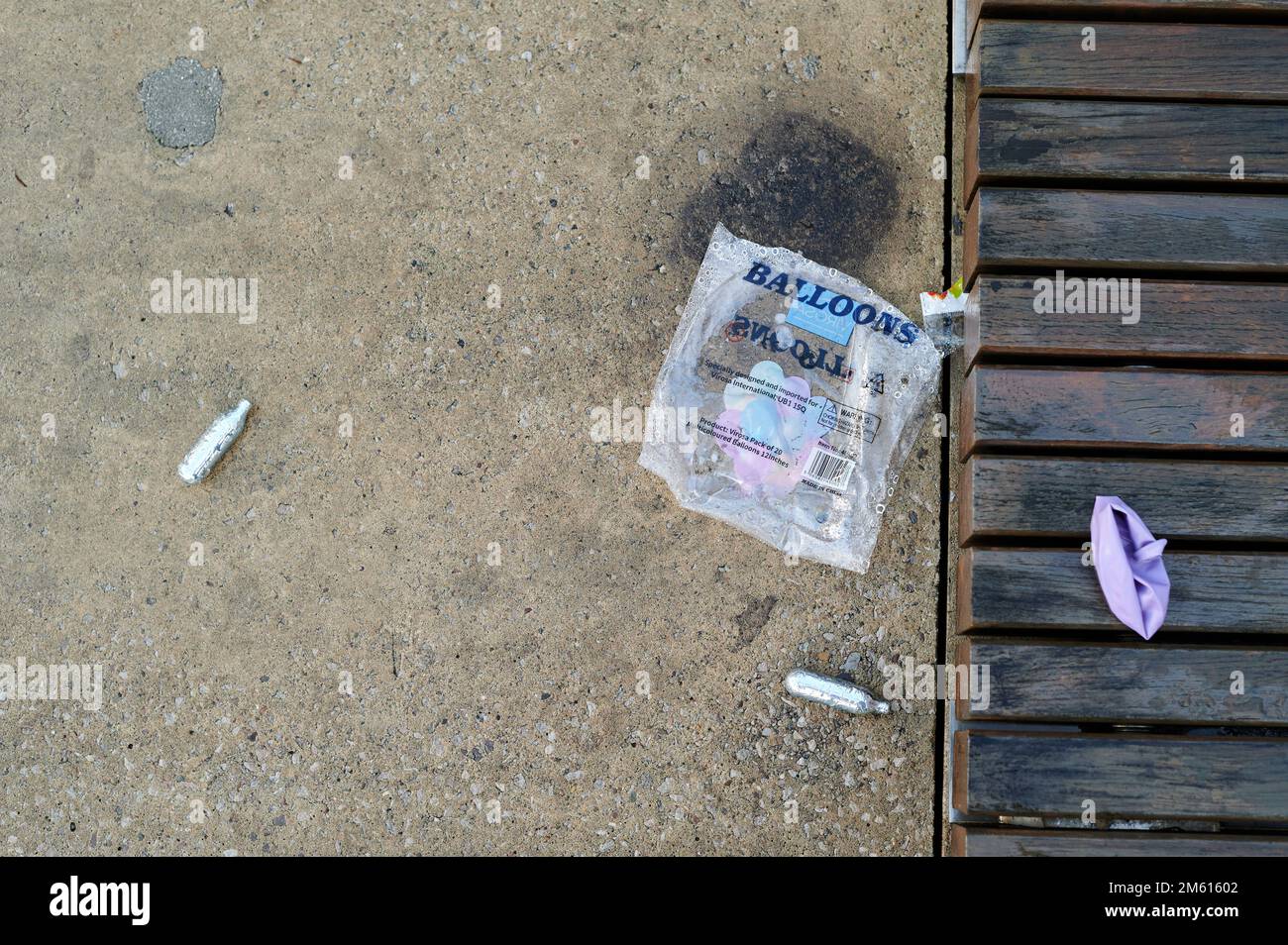 23 dec 2022 London UK Discarded Nitrous Oxide Canisters and balloon