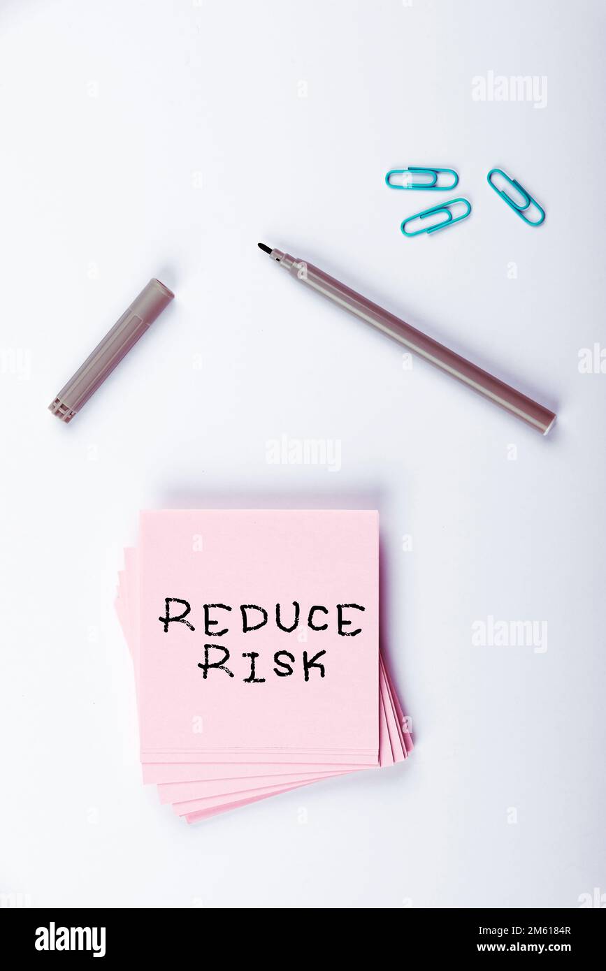 Text sign showing Reduce Risk. Word for lessen the potential damage ...