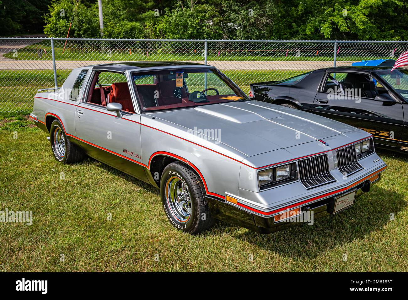 Iola, WI - July 07, 2022: High perspective front corner view of a 1984 Hurst/Olds Cutlass Supreme Coupe at a local car show. Stock Photo