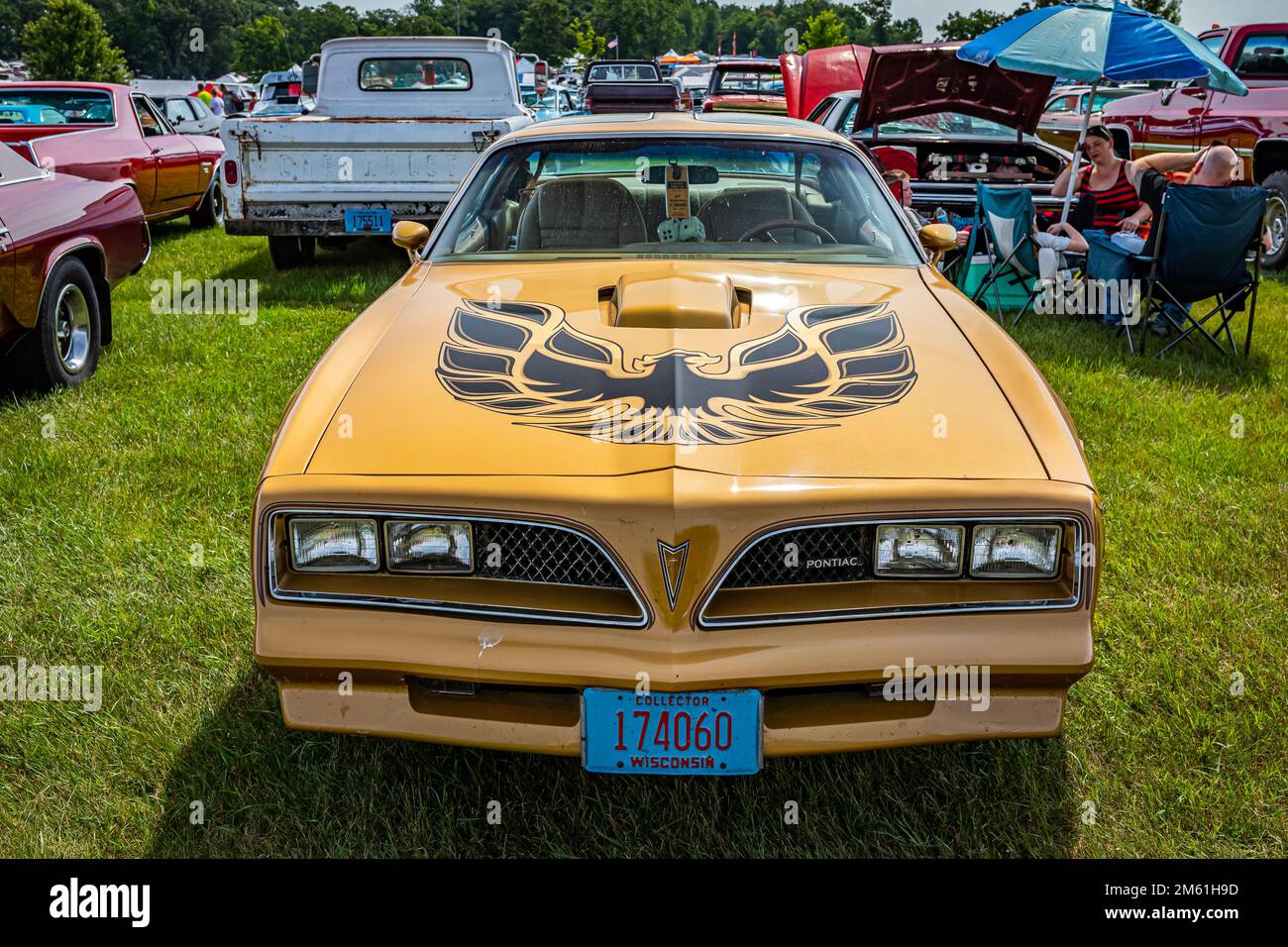 Iola, WI - July 07, 2022: High perspective front view of a 1978 Pontiac Firebird Trans Am at a local car show. Stock Photo
