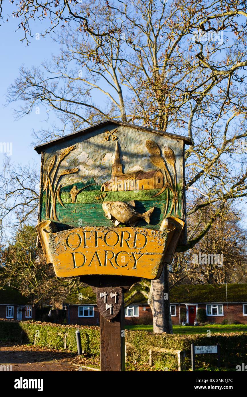 Offord Darcy village carved and painted sign post. Cambridgeshire, England Stock Photo