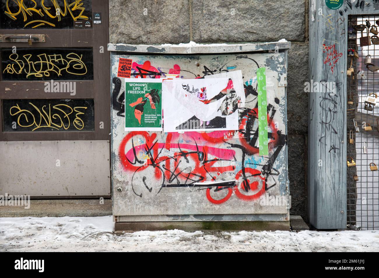 Posters on street cabinet in Tampere, Finland Stock Photo