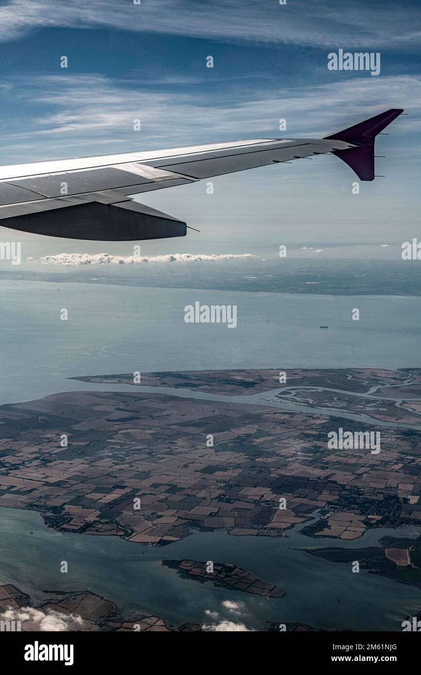Aeroplane climbing having taken off from Heathrow Airport Stock Photo