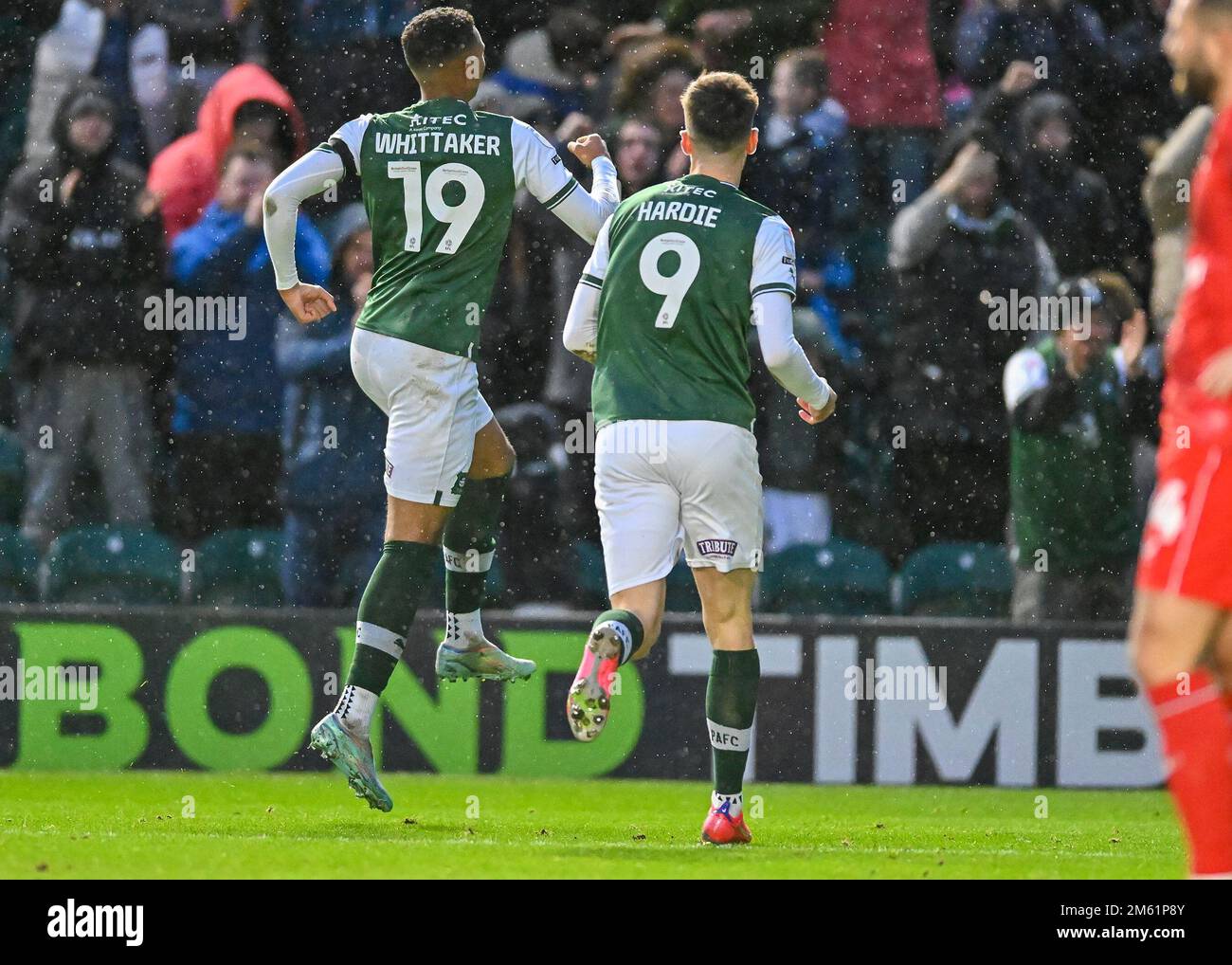 GOAL Plymouth Argyle forward Morgan Whittaker (19) and Plymouth Argyle forward Ryan Hardie  (9) celebrates a goal to make it 3-1  during the Sky Bet League 1 match Plymouth Argyle vs MK Dons at Home Park, Plymouth, United Kingdom, 1st January 2023  (Photo by Stanley Kasala/News Images) Stock Photo