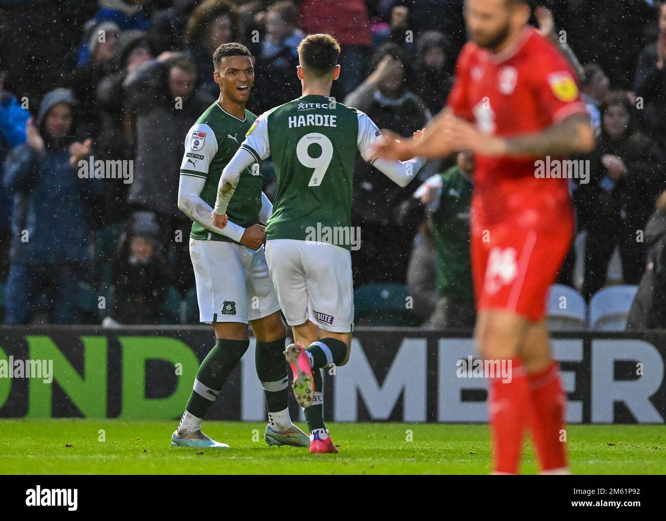 GOAL Plymouth Argyle forward Morgan Whittaker (19) and Plymouth Argyle forward Ryan Hardie  (9) celebrates a goal to make it 3-1  during the Sky Bet League 1 match Plymouth Argyle vs MK Dons at Home Park, Plymouth, United Kingdom, 1st January 2023  (Photo by Stanley Kasala/News Images) Stock Photo