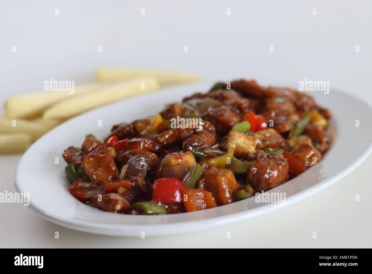 Chilly paneer with baby corn. An Indo Chinese dish made with cubes of