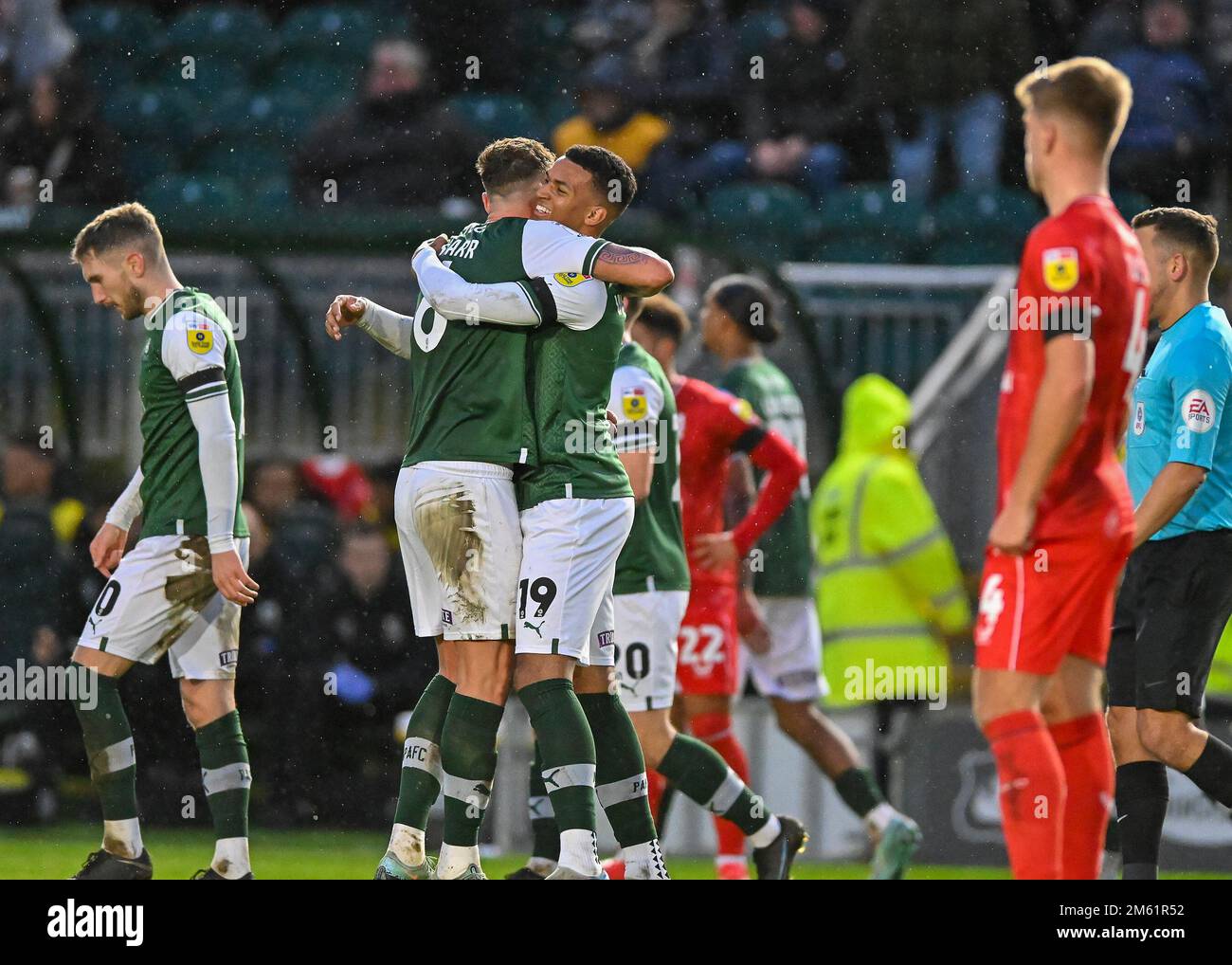 Plymouth, UK. 01st Jan, 2023. GOAL Plymouth Argyle defender Dan Scarr (6) and Plymouth Argyle forward Morgan Whittaker (19) celebrates a goal to make it 3-1 during the Sky Bet League 1 match Plymouth Argyle vs MK Dons at Home Park, Plymouth, United Kingdom, 1st January 2023 (Photo by Stanley Kasala/News Images) in Plymouth, United Kingdom on 1/1/2023. (Photo by Stanley Kasala/News Images/Sipa USA) Credit: Sipa USA/Alamy Live News Stock Photo
