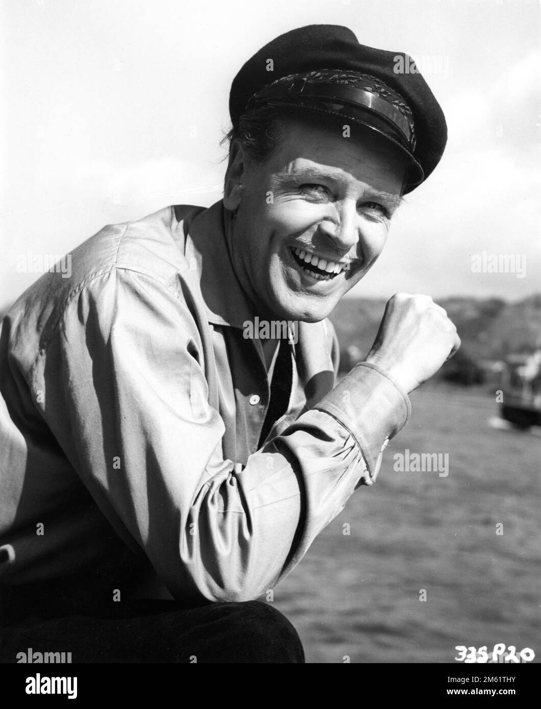 O.W. FISCHER Portrait on boat on river Rhine in WHIRLPOOL 1959 director LEWIS ALLEN novel / screenplay The Lorelei by Lawrence P. Bachmann music Ron Goodwin costume design Julie Harris The Rank Organisation Stock Photo