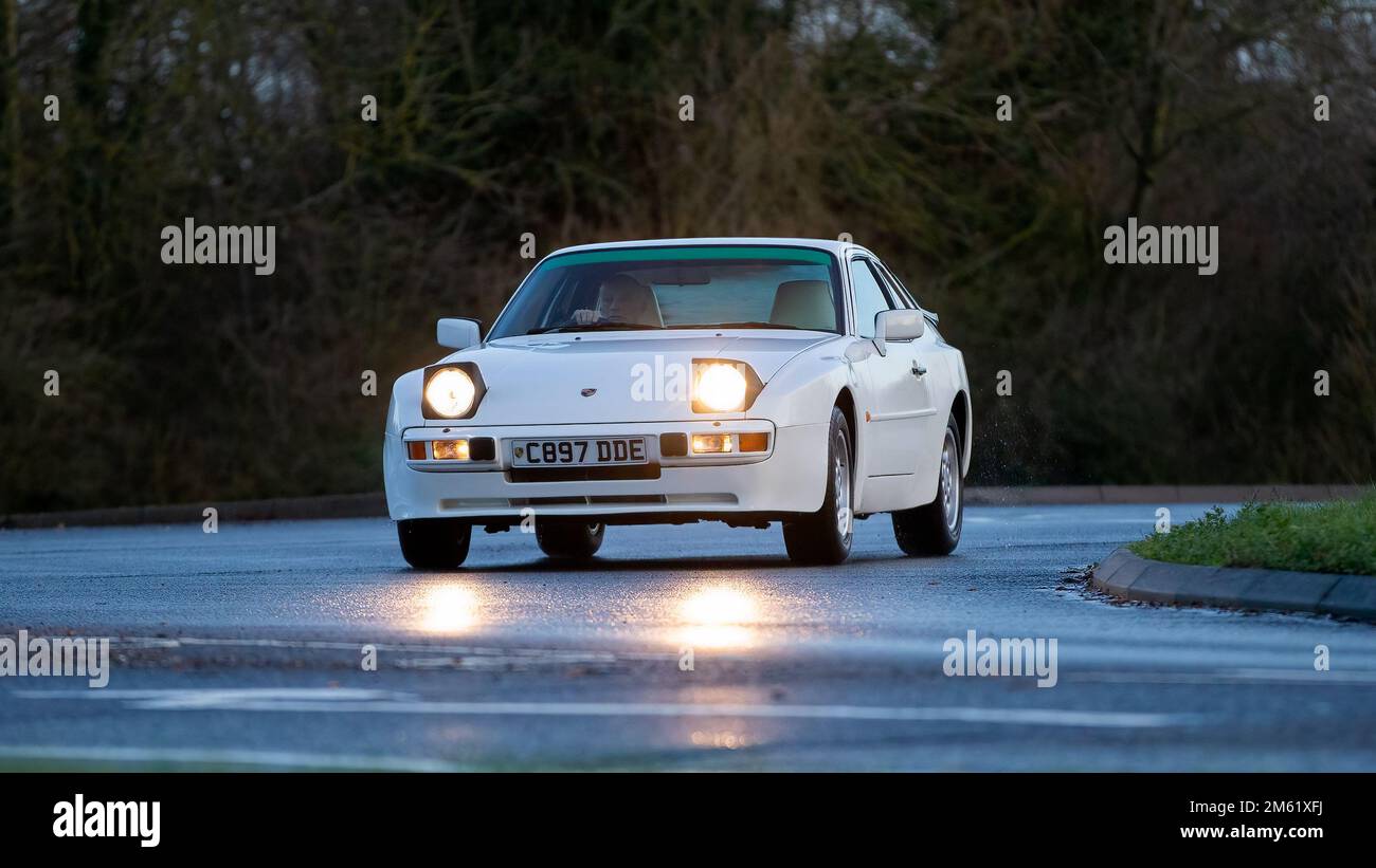 1985 white Porsche 944 classic car with pop up headlights on 1985 white Porsche 944 classic car with pop up headlights on