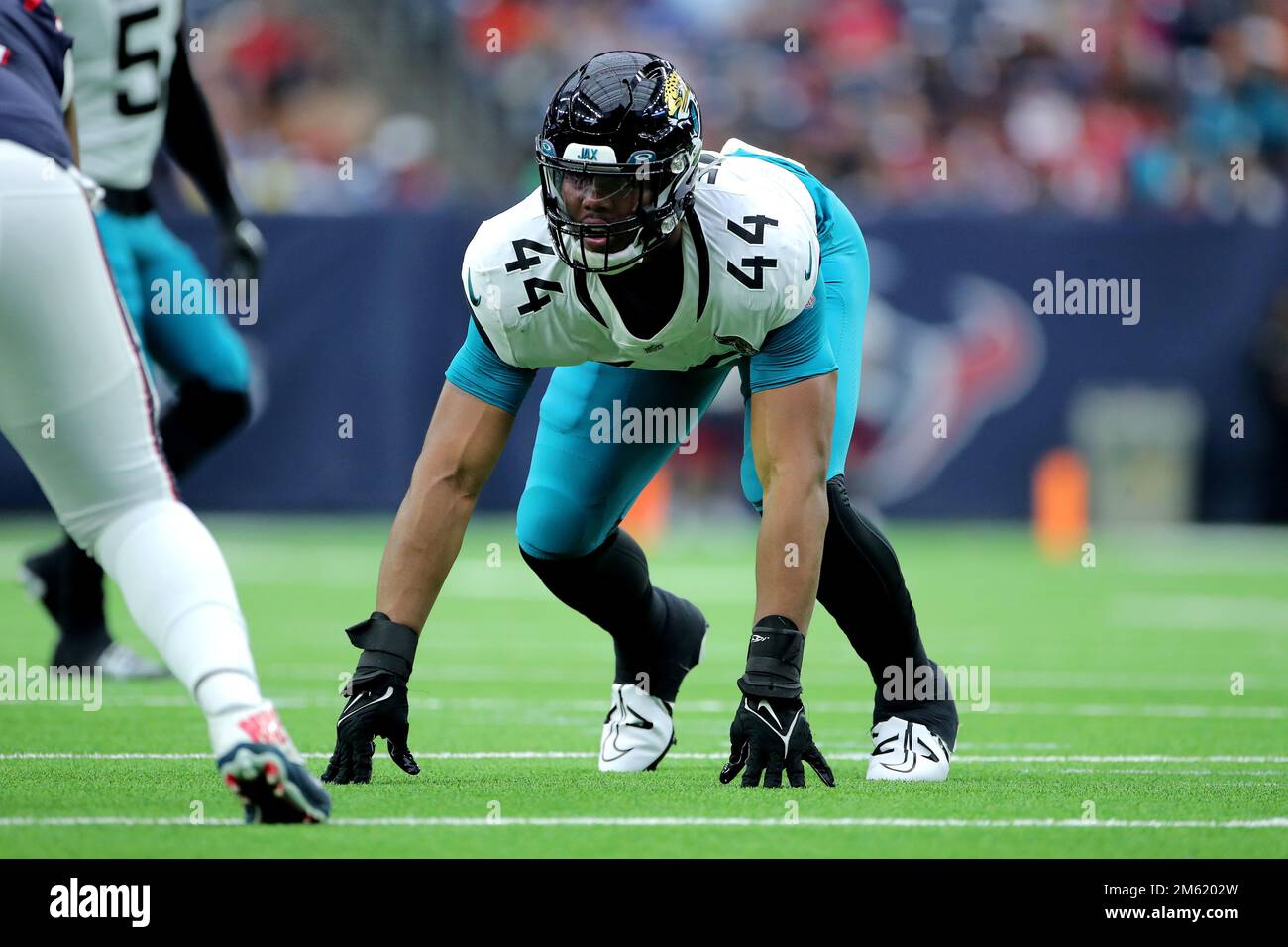 Jacksonville Jaguars linebacker Travon Walker (44) runs onto the field for  an NFL football game against the Tennessee Titans, Saturday, Jan. 7, 2023,  in Jacksonville, Fla. The Jaguars defeated the Titans 20-16. (