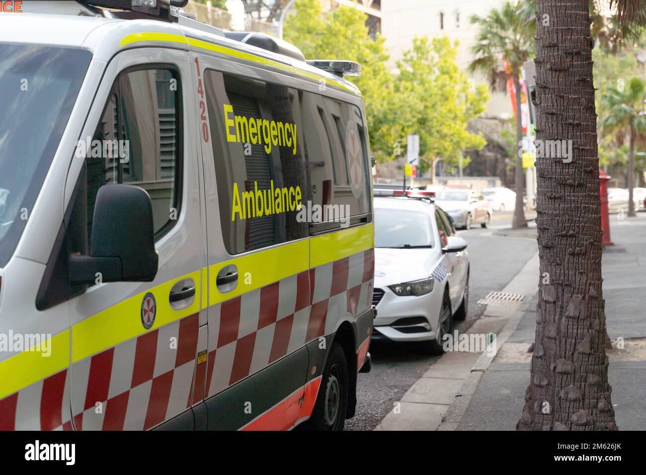 Emergency Ambulance and Police arrived at an apartment building to