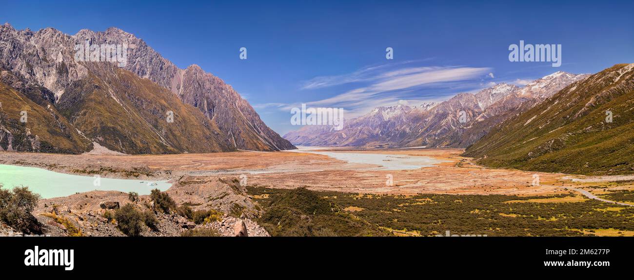Wide scenic nature valley in Mt Cook national park of New Zealand at Tasman lake and river. Stock Photo