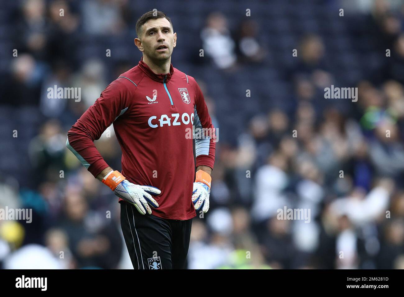 Aston Villa goalkeeper Emiliano Martinez warms up on the pitch ahead of the  Premier League match at the Tottenham Hotspur Stadium, London. Picture  date: Sunday January 1, 2023 Stock Photo - Alamy