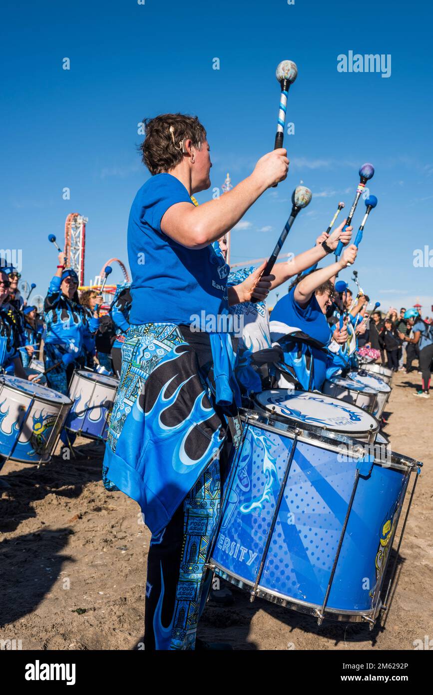 Brooklyn, New York - January 1, 2023: Fogo Azul NYC, NYC's Women Brazilian-American Drumline, 2023 Coney Island Polar Bear Club New Year's Day Plunge, Coney Island, Brooklyn, New York City. Stock Photo