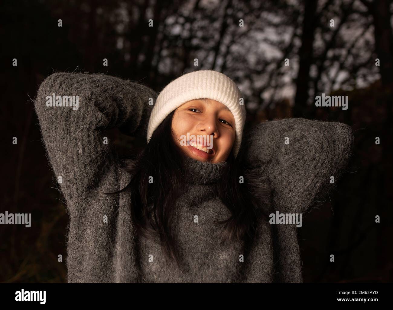 Woman lake winter hood rear view hi-res stock photography and images ...
