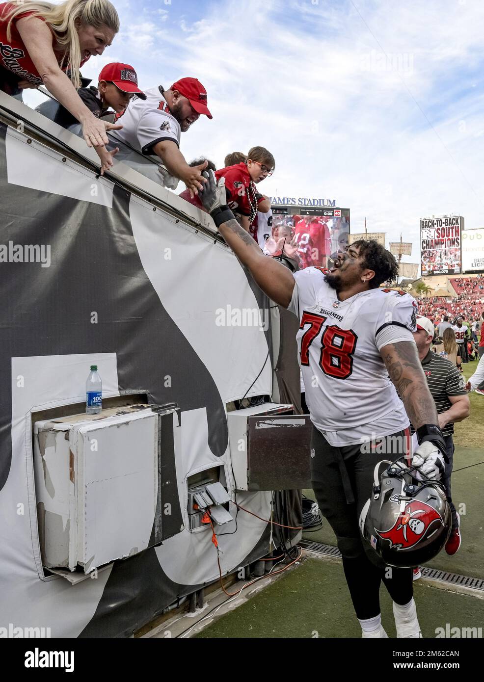 Tampa, United States. 01st Jan, 2023. Tampa Bay Buccaneers offensive tackle Tristan Wirfs (78) celebrates with fans after the game with the Carolina Panthers at Raymond James Stadium in Tampa, Florida on Sunday, January 1, 2023. The Buccaneers clinched the NFC South with a 30-24 win over the Panthers. Photo by Steve Nesius/UPI. Credit: UPI/Alamy Live News Stock Photo