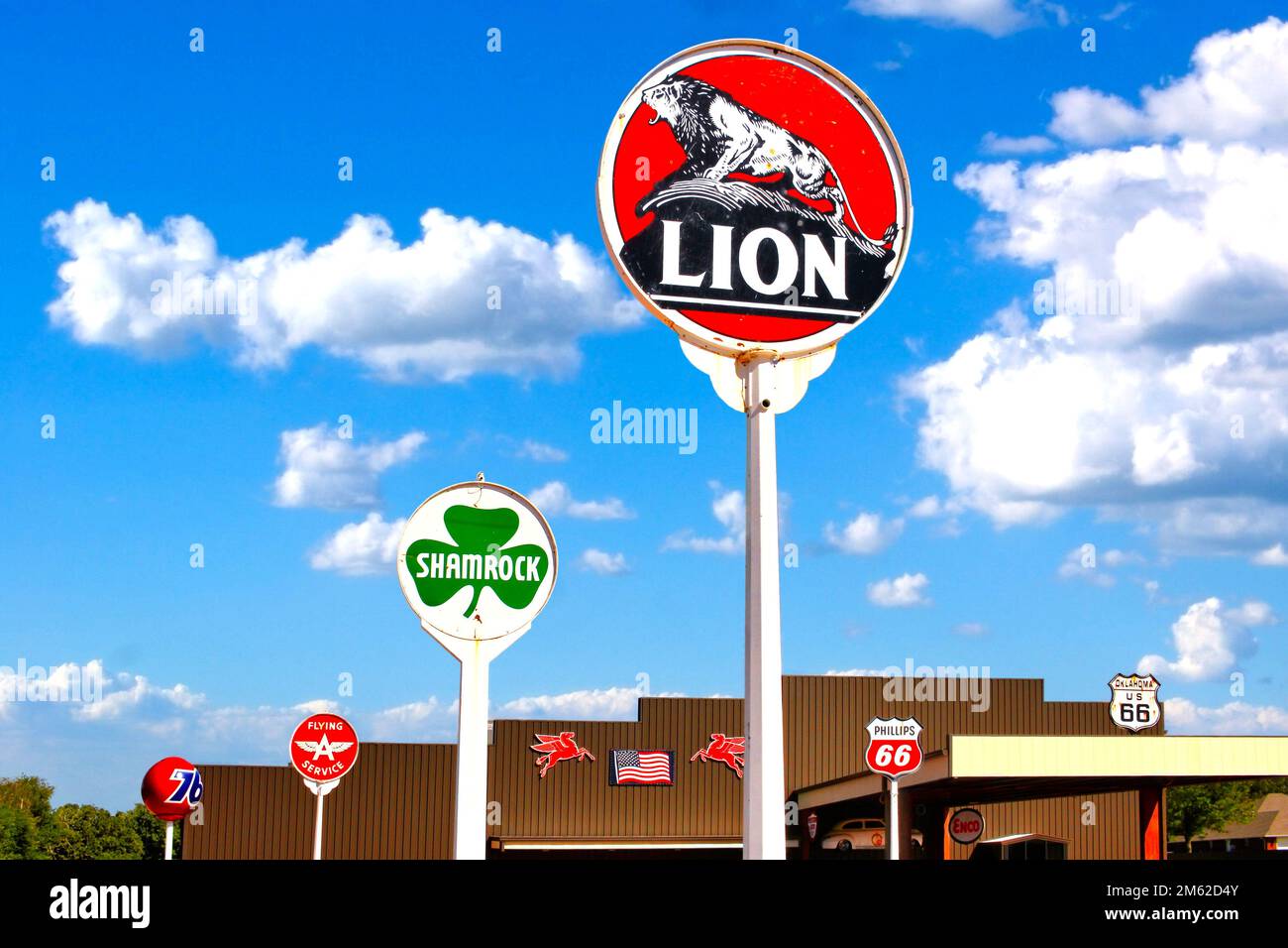 Vintage gas station signs adorn the parking lot of Route 66 Bowl on Route 66 in Chandler Oklahoma. Stock Photo