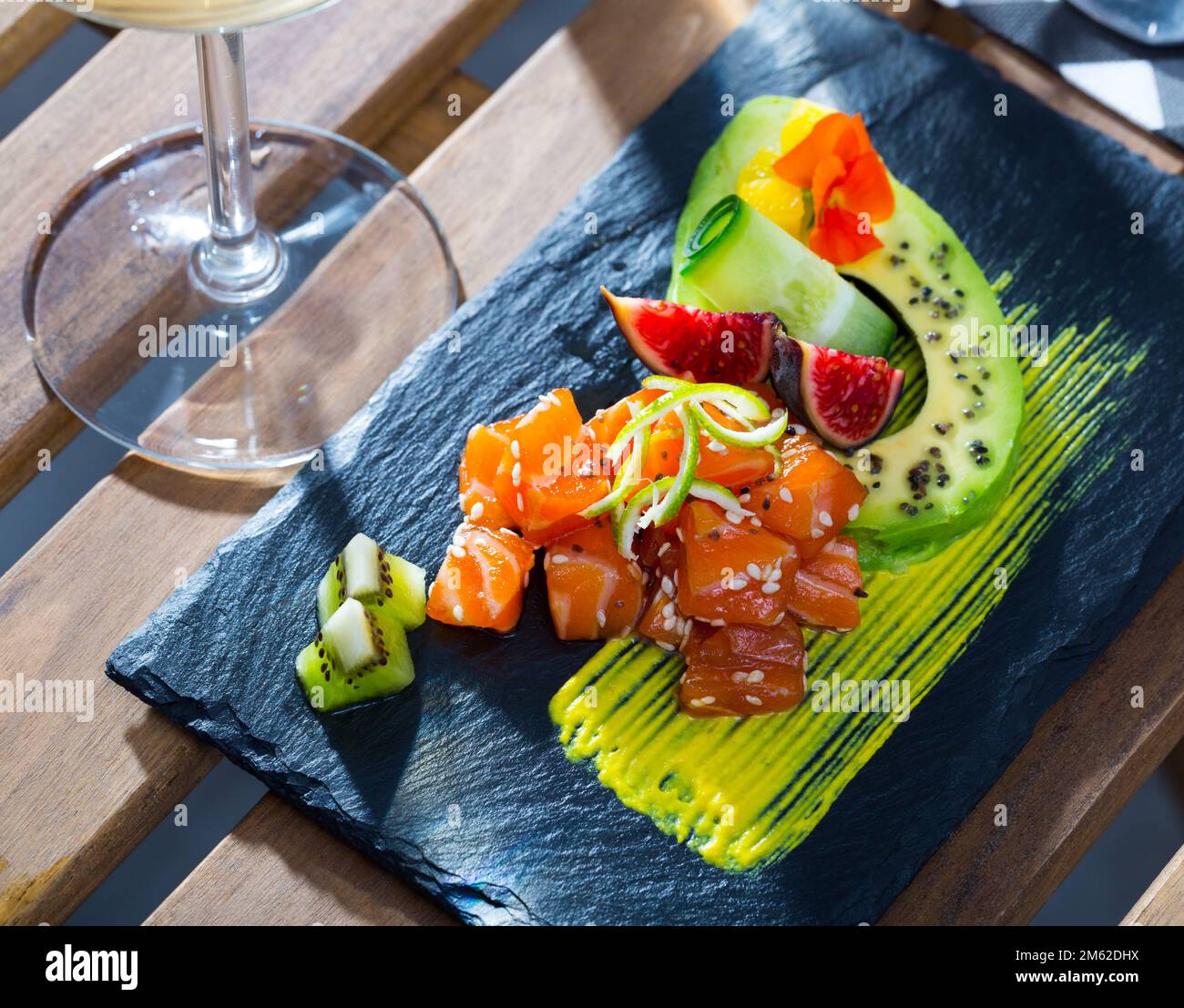 Tuna tartare with avocado and piquant mango sauce Stock Photo Alamy
