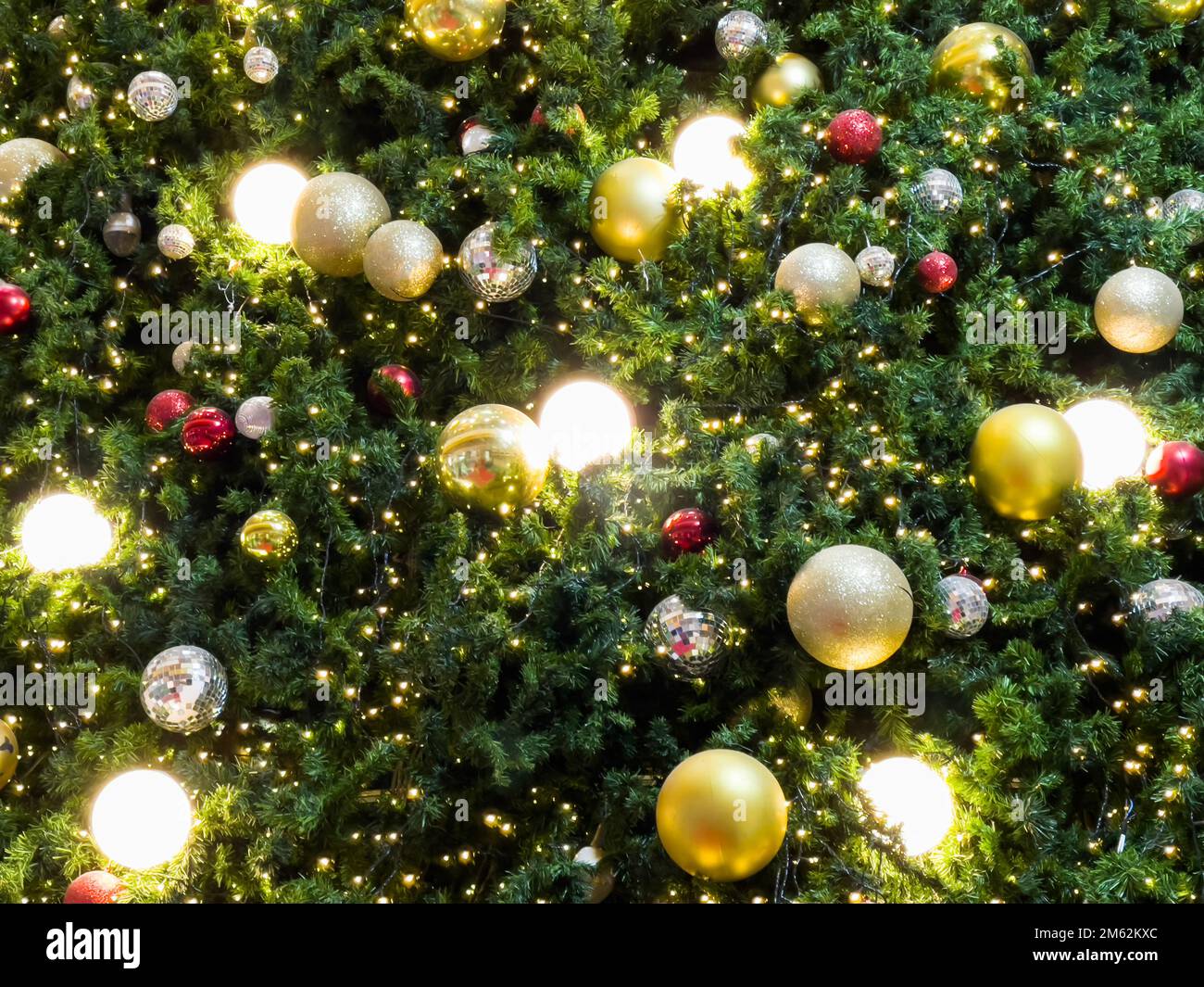 Christmas tree with light bulbs background, stock photo Stock Photo