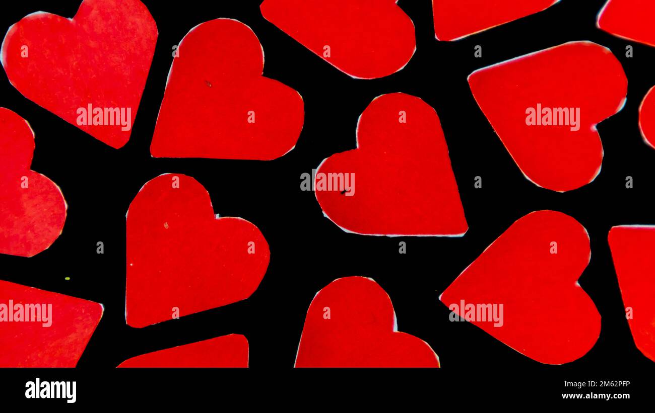 red heart on black background for valentine's day Stock Photo - Alamy
