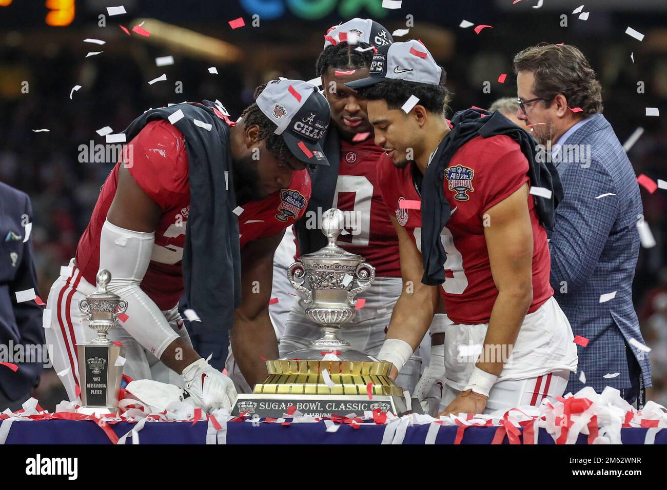December 31, 2022: Alabama players Will Anderson Jr. (31), Jordan Battle (9), and Bryce Young (9) hold up the trophy after the 89th annual Allstate Sugar Bowl between the Alabama Crimson Tide and the Kansas St. Wildcats at the Caesars Superdome in New Orleans, LA. Jonathan Mailhes/CSM Stock Photo