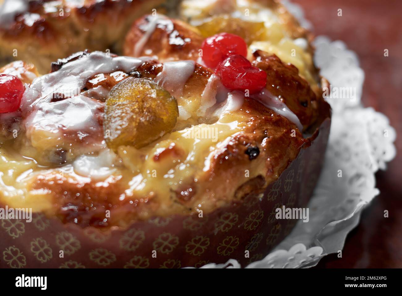 Close up of fruit cake with custard cream, fig, cherries, dry fruits
