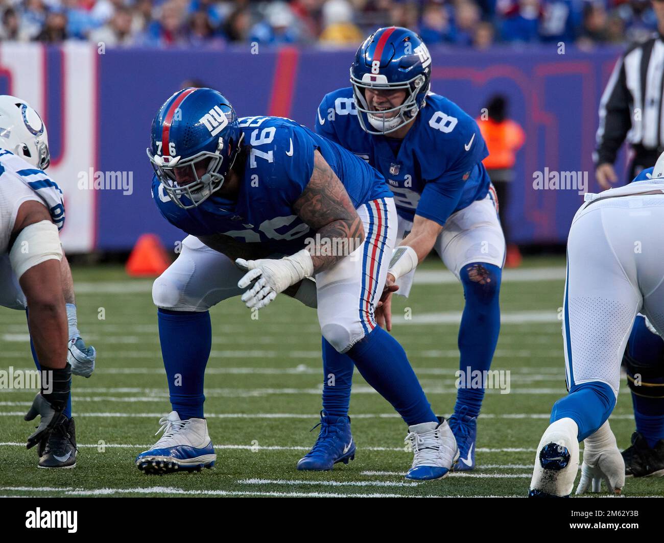 January 1, 2023, East Rutherford, New Jersey, USA: New York Giants  quarterback Daniel Jones (8) takes a snap from center Jon Feliciano (76)  during a NFL game against the Indianapolis Colts in