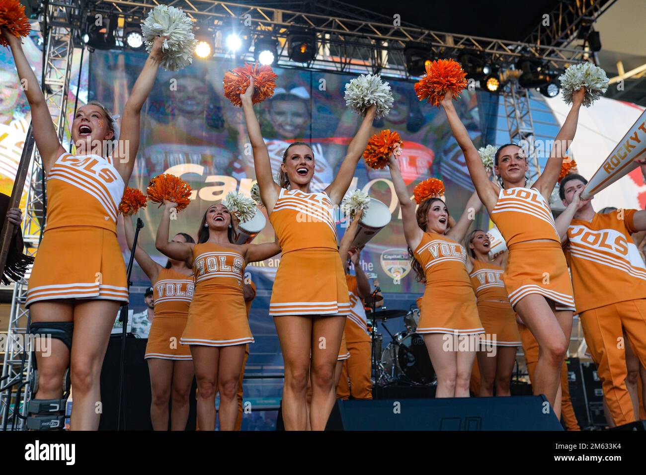 Miami Gardens, FL, USA. 30th Dec, 2022. The Tennessee cheerleaders performs during the Orange Bowl Fan Fest prior to the 2022 Capital One Orange Bowl football game between the Clemson Tigers and Tennessee Volunteers at Hard Rock Stadium in Miami Gardens, FL. Kyle Okita/CSM/Alamy Live News Stock Photo