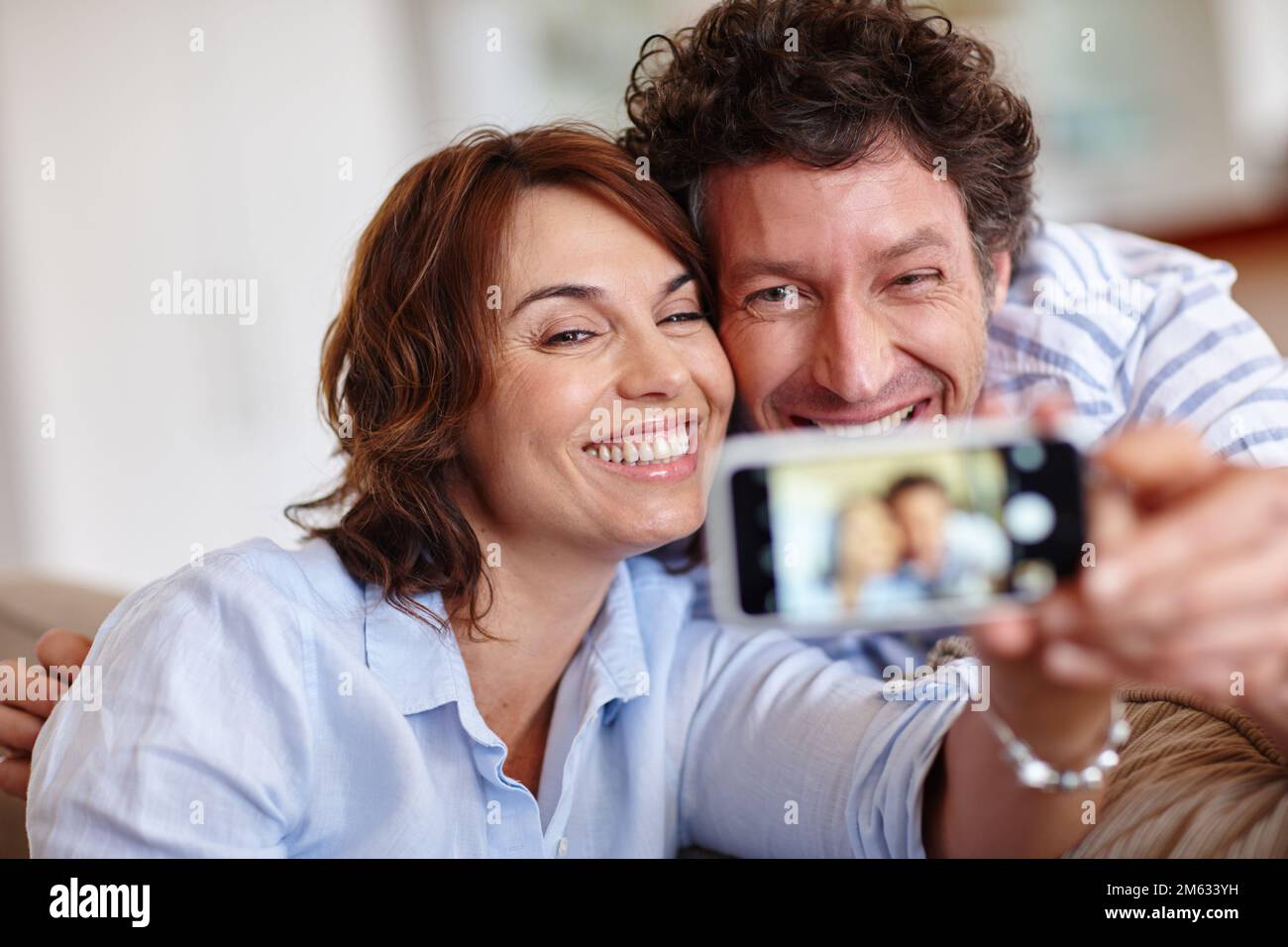 lets-share-our-love-with-everyone-a-husband-and-wife-taking-a-selfie