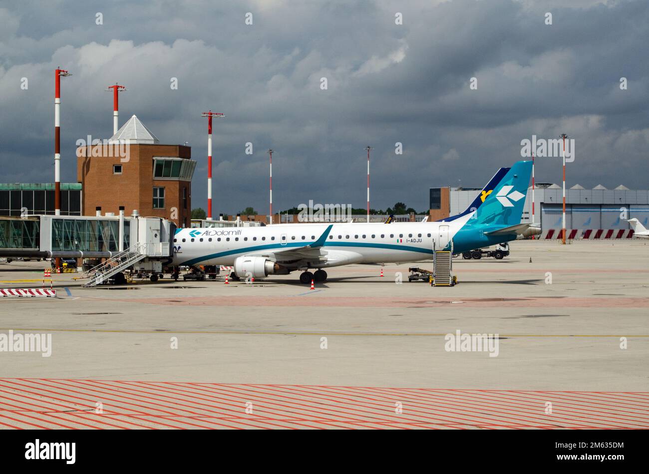 Venice, Italy - April 19, 2022: Embraer E195LR aircraft belonging to the Air Dolomiti regional airline at an airbridge at Marco Polo Airport in Venice Stock Photo