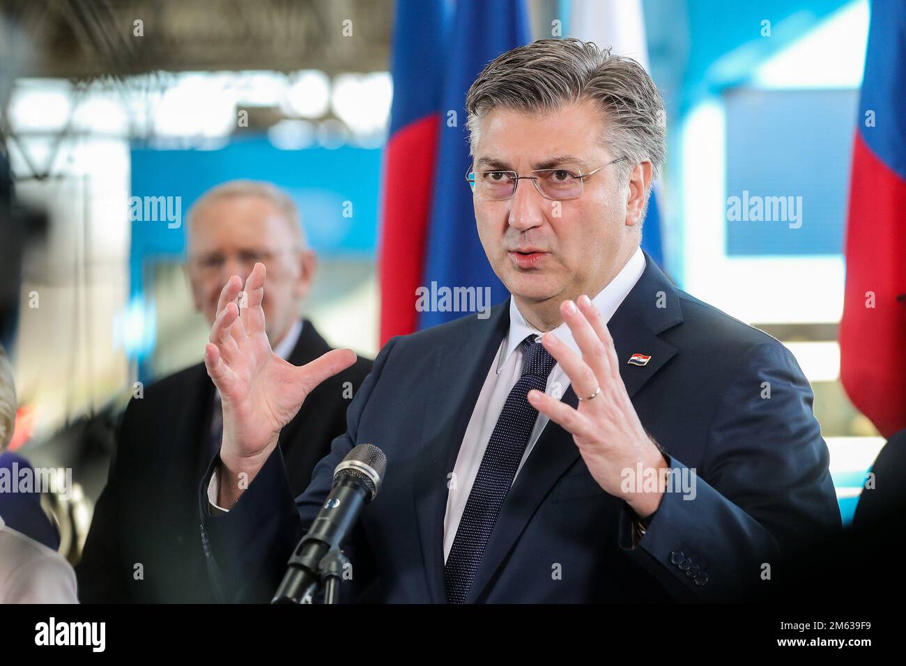 (230102) -- BREGANA, Jan. 2, 2023 (Xinhua) -- Croatian Prime Minister Andrej Plenkovic speaks to the media at the Bregana border crossing between Croatia and Slovenia, Jan. 1, 2023. Ursula von der Leyen, president of the European Commission, visited Croatia on New Year's day to mark the country's entry into the eurozone and the border-free Schengen area.Various activities were held at border crossings with Slovenia and Hungary on early Sunday morning to celebrate the historic moment. (Luka Stanzl/PIXSELL via Xinhua) Stock Photo