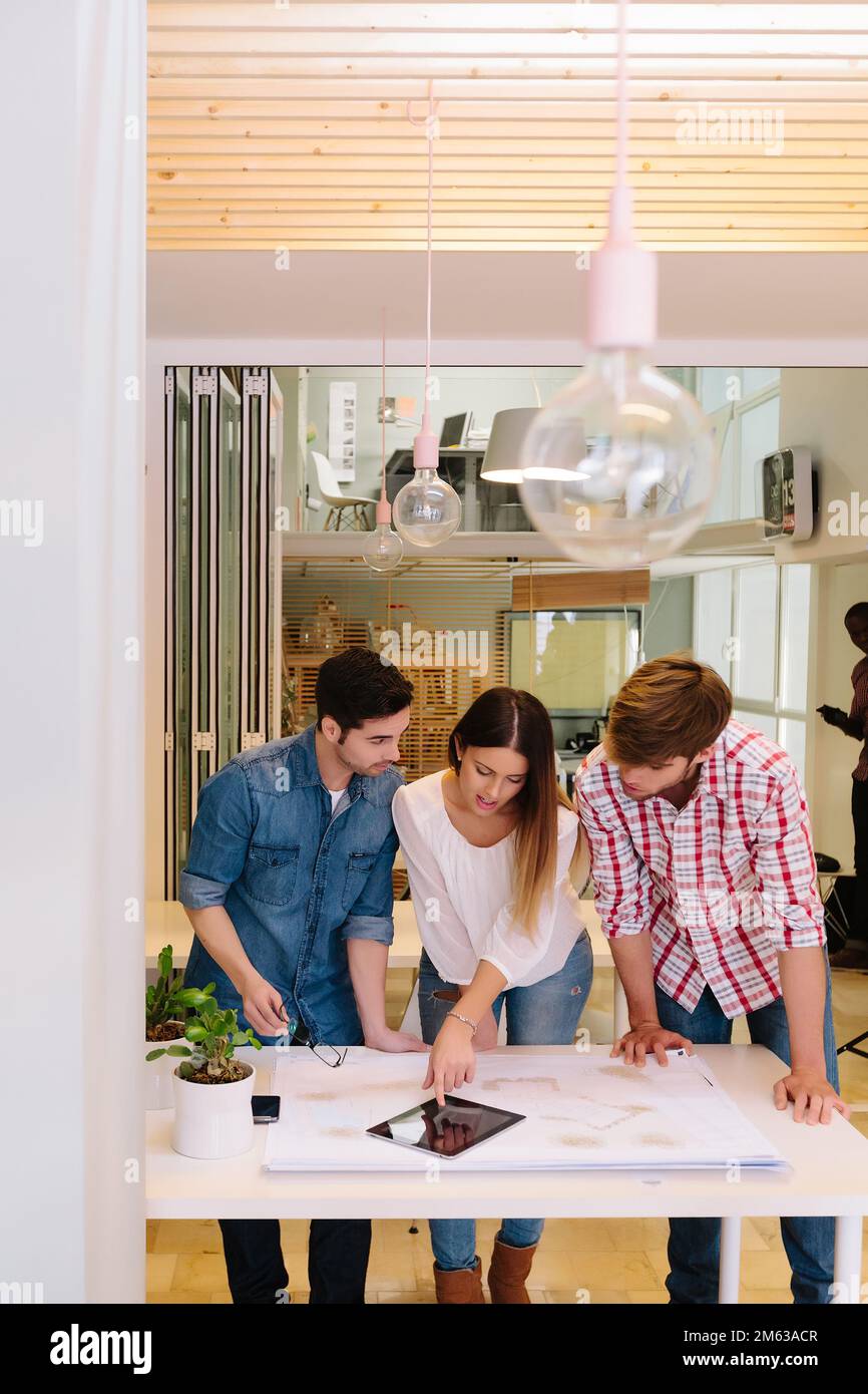 Architects and engineers working at the Office Stock Photo