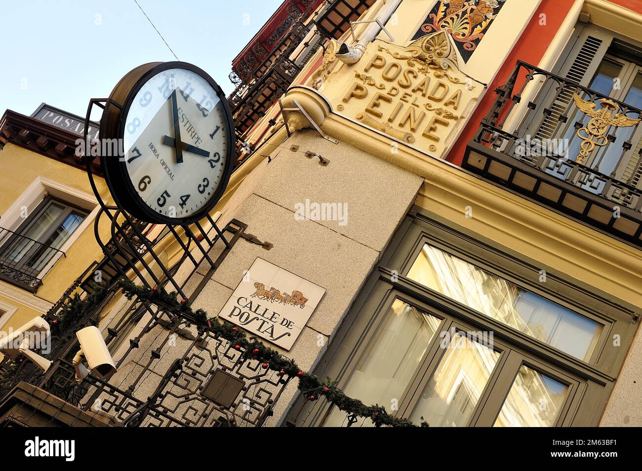 Wall Clock in the Postas Street, Madrid Stock Photo Alamy