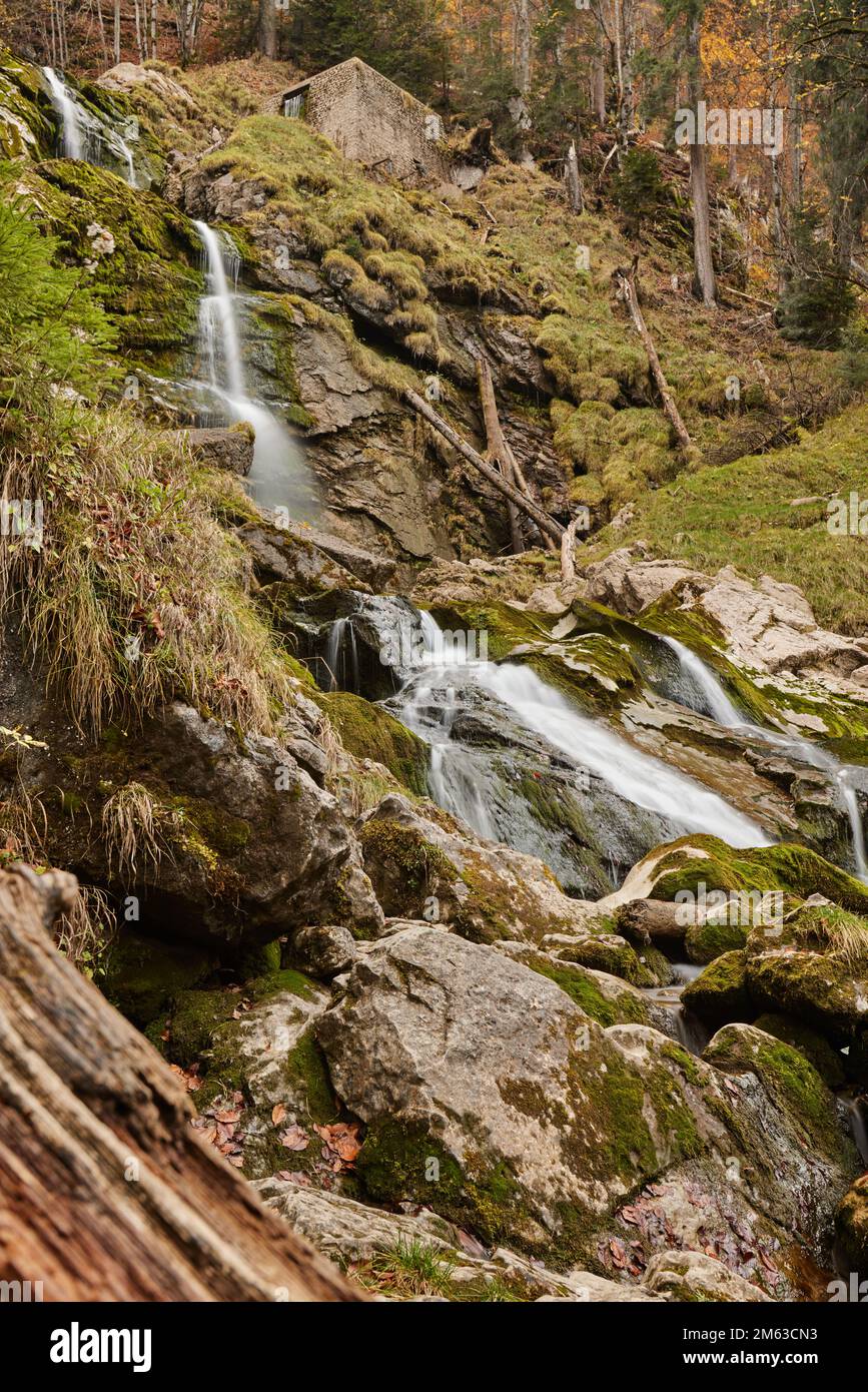 Water going down mountain in Switzerland nature Stock Photo