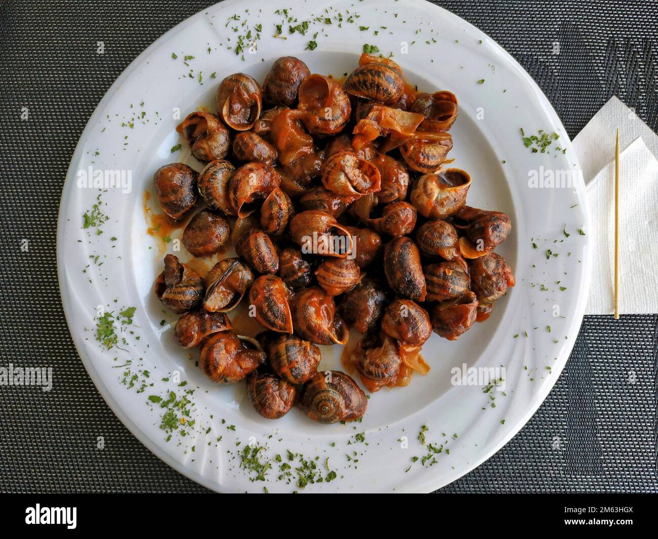 Cooked snails. Typical food from France and Spain Stock Photo Alamy