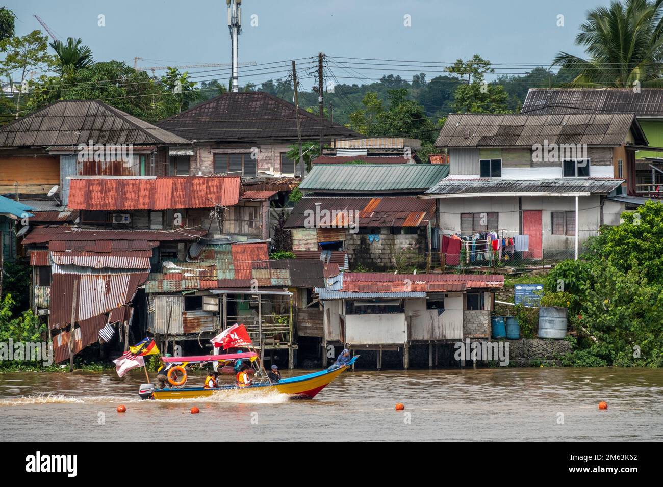 Malay houses by the Sarawak River in Kuching are traditional wooden