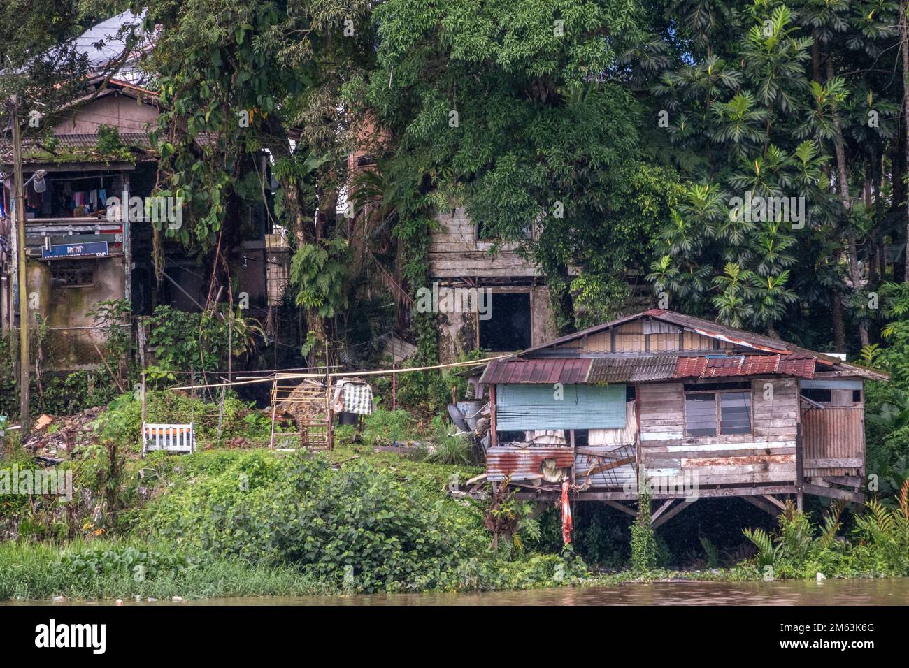 Malay houses by the Sarawak river, Kuching, East Malaysia, Borneo