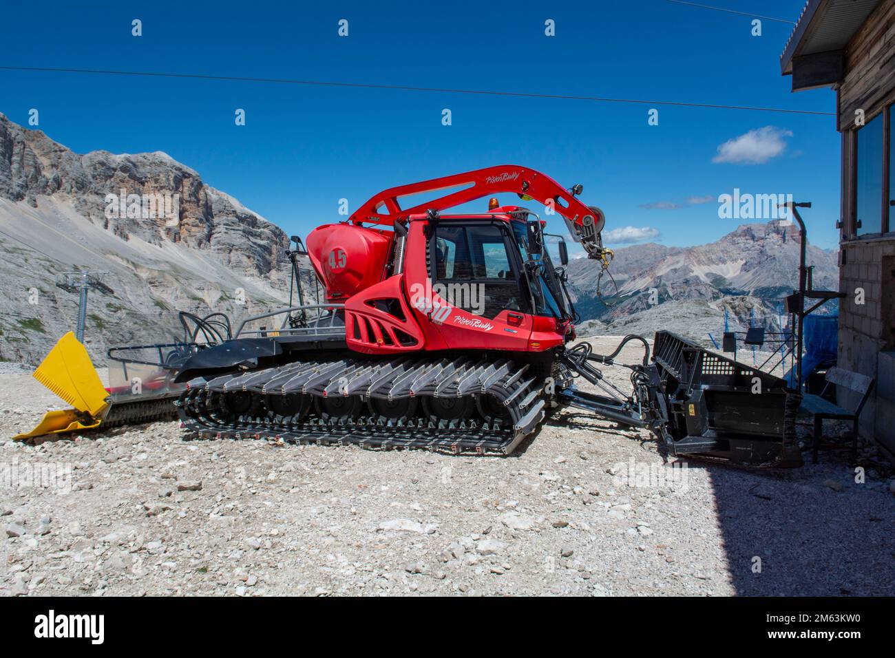 Cortina d'Ampezzo, Dolomites, Italy - July, 8,  2022 : Snow groomer in the summer. Dolomites. Italy. Stock Photo