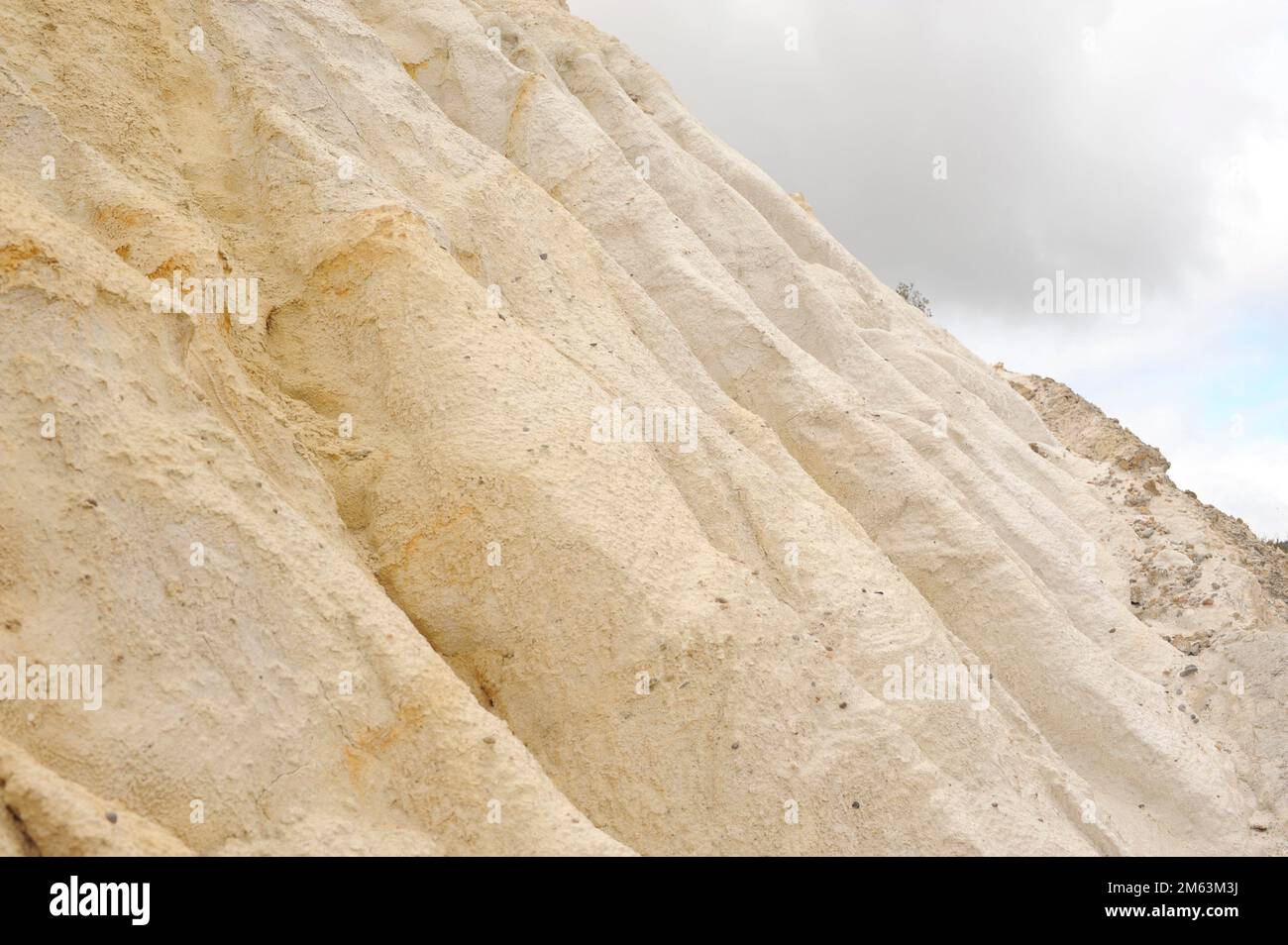 Kaolin or China clay is a sedimentary rock rich on kaolinite a phyllosilicate mineral. It is used in ceramics (porcelain), paper industrie, medicine Stock Photo
