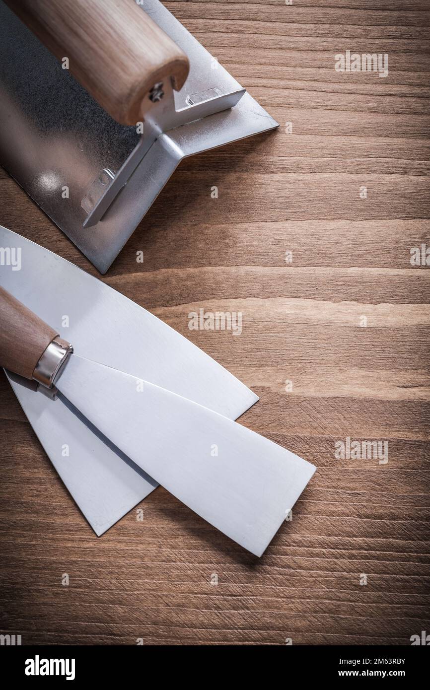 vertical version two paint scrapers and surfacer Stock Photo Alamy