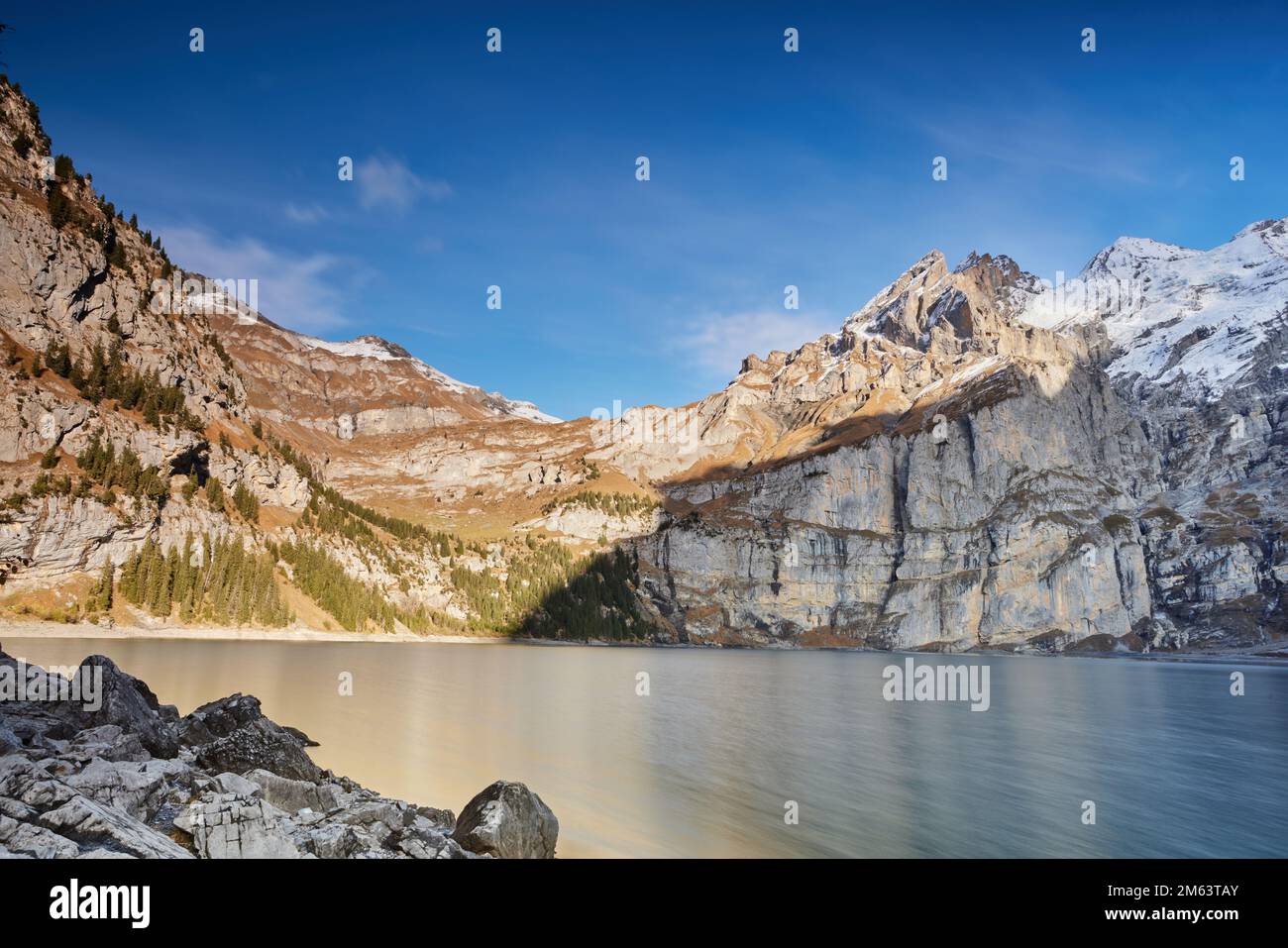 Amazing blue lake with large mountain in Schweiz Stock Photo