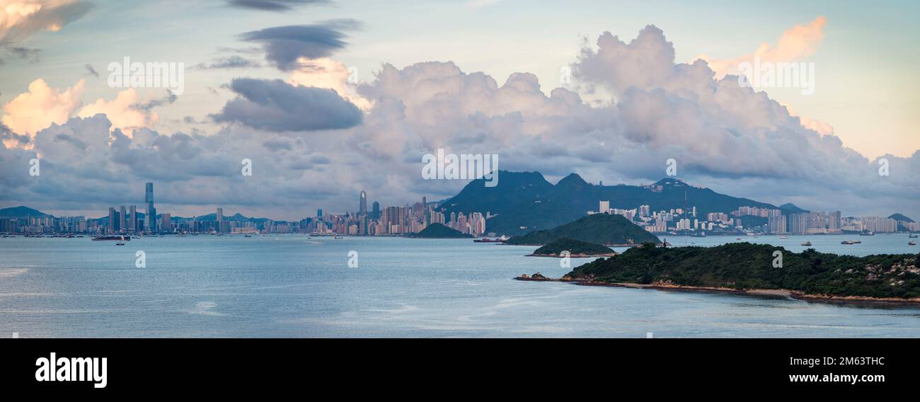 Hi-resolution panorama of the city skyline of Hong Kong Island and Kowloon at sunset, viewed from Lantau Island, 2012 (79Mpx) Stock Photo