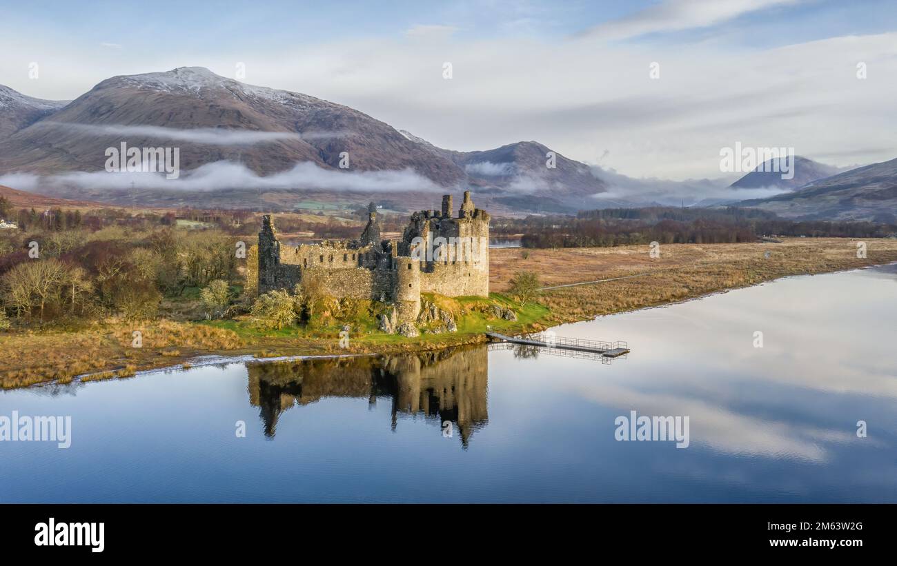 Kilchurn Castle on Loch Awe, Historic Scottish Castle reflected in the loch. Close to Glasgow and Glencoe, famous for whiskey distilleries and rugged Stock Photo