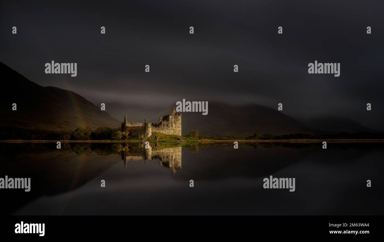 Kilchurn Castle on Loch Awe, Historic Scottish Castle reflected in the loch. Close to Glasgow and Glencoe, famous for whiskey distilleries and rugged Stock Photo
