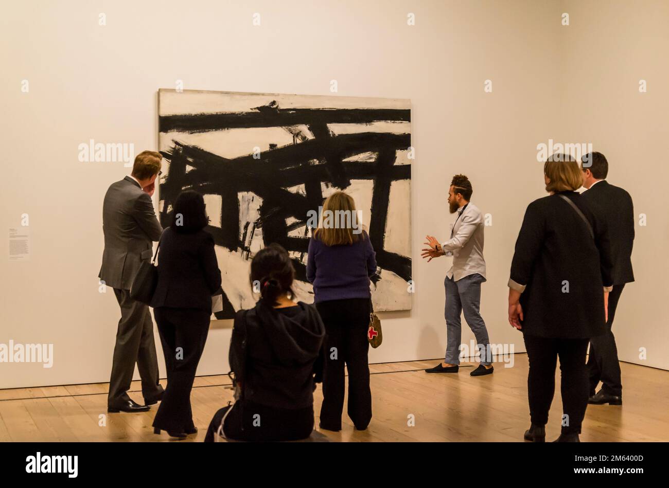 Curator explaining Franz Kline painting Mahoning, 1956, Whitney Museum