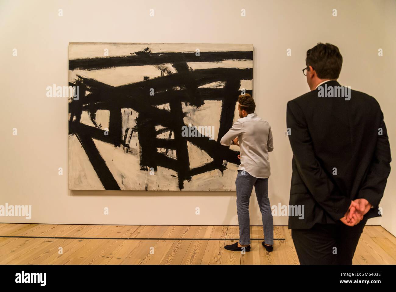 Curator explaining Franz Kline painting Mahoning, 1956, Whitney Museum