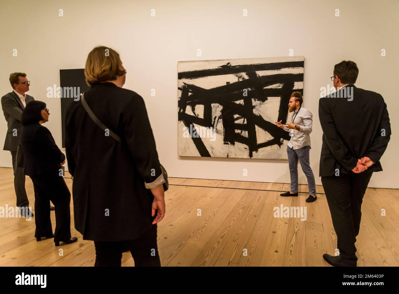 Curator explaining Franz Kline painting Mahoning, 1956, Whitney Museum