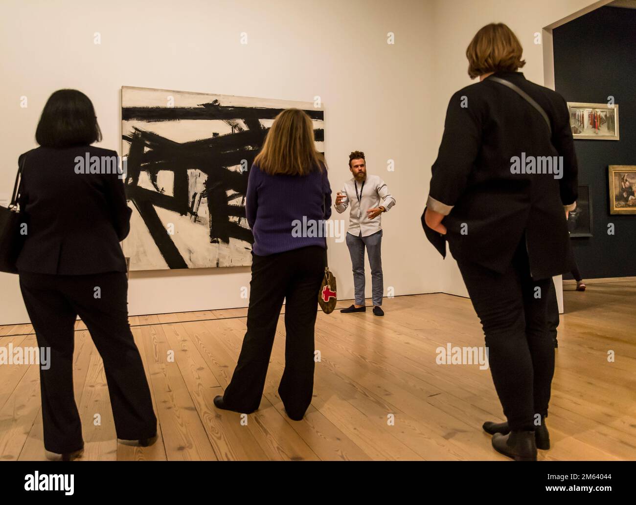 Curator explaining Franz Kline painting Mahoning, 1956, Whitney Museum