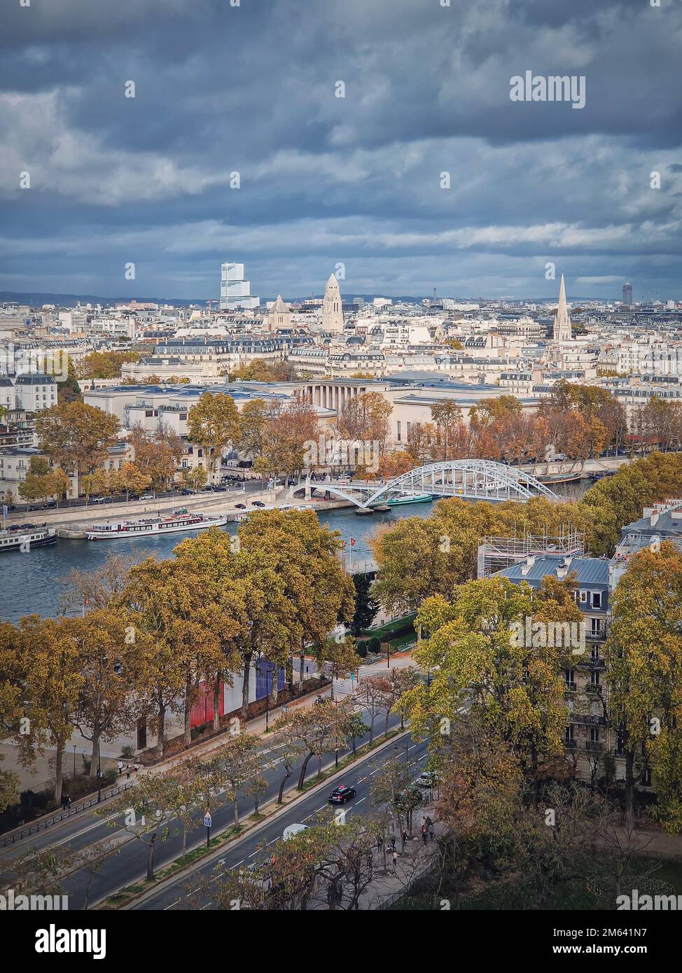 Aerial view of Paris city, France. Autumnal cityscape with colorful trees along Seine river Stock Photo