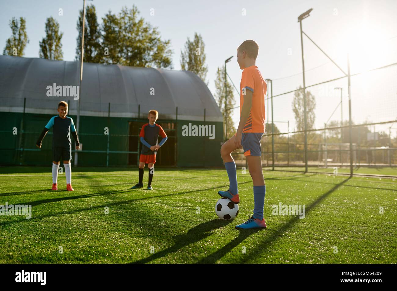Young boys in sports soccer club on training unit improving skills Stock Photo